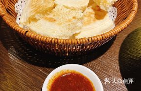 Hand-Torn Meat from Earth Oven