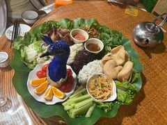 -沐毫傣泐云南菜孔雀宴•手抓饭傣味烧烤(曼听公园店)