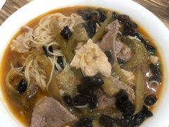 特色酸菜肉片米线-巴鑫田姐米线(巴南万达店)