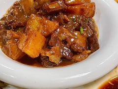 土豆烧牛腩-华春餐馆(鱼山路店)
