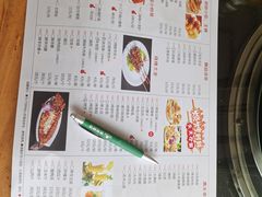 -明何记涮牛肚(品牌首店隋唐植物园南门古城路店)