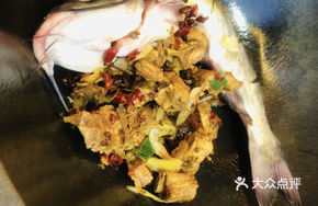 Stewed Pork Ribs and Fish in Iron Pot
