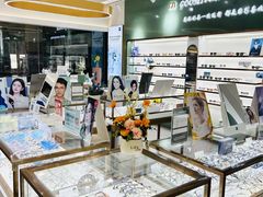 -GOOMI久米眼镜·蔡司·依视路·明月官方授权店(龙德紫金店)