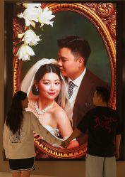 -乐派诗婚纱摄影