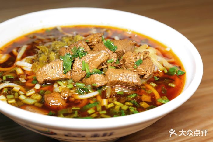 苗耕老贵州米线(万达店)麻辣鸡肉米线图片