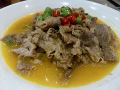 酸汤肥牛-添福来墨鱼饺子 · 海鲜东北菜(大连星海·黄浦路店)