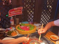 -老牌坊云南鱼豆花火锅(哈西万达店)