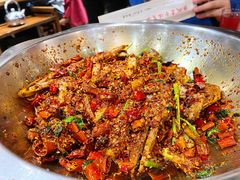 爆辣干锅鸭头-安诚居干锅鸭头(八角店)