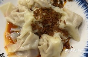 Spicy Pork and Bamboo Shoot Dumplings in Red Soup