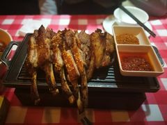 馕坑烤羊排-西域阿里马新疆菜·清真(桂花路店)