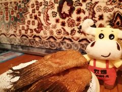 酥炸鸦片鱼尾-阿里家·新疆烤肉酒場 by MIG