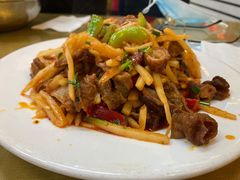 酸笋炒肥肠-红鼻子桂林米粉(金唐新光界店)