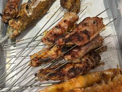 -喜悦小串丹东小黄牛海鲜烧烤大排档(民主广场店)