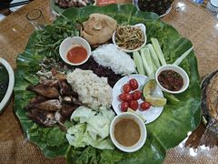 -沐毫傣泐云南菜孔雀宴•手抓饭傣味烧烤(曼听公园店)