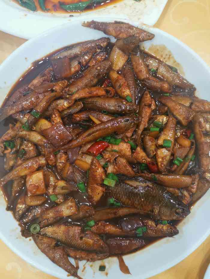 花,然后又到周庄来回走了一遭,回来路上儿子说饿了,正好回到商榻镇上