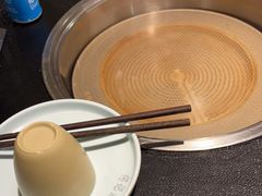 -明何记涮牛肚(品牌首店隋唐植物园南门古城路店)