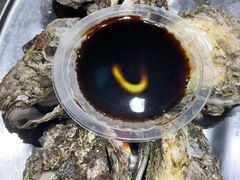 -蚝哥花姐湛江烤生蚝(美丽湾市场店)