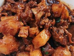 土豆烧牛腩-华春餐馆(鱼山路店)