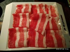 雪山肥牛-老牌坊云南鱼豆花火锅(哈西万达店)