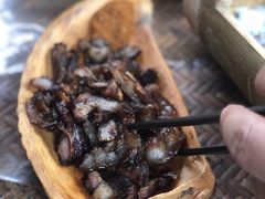 烤猪脸肉-基诺山寨.版纳民族特色菜