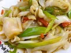 葱爆螺片-富临港·蒸汽海鲜·手抓海鲜·炒菜(栈桥店)