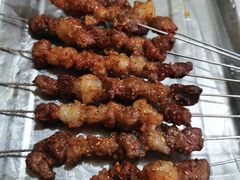 喂口牛肉串-胖姐涮肚烧烤