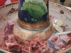 -毛辣果·贵州红酸汤牛肉火锅(西单店)