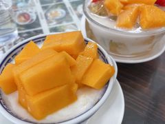 芒果椰汁双皮奶-周大娘牛乳(旧寨古村总店)