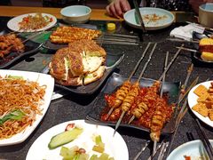 -明何记涮牛肚(品牌首店隋唐植物园南门古城路店)