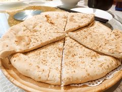 馕坑芝麻馕-巴扎美食·新疆菜·西域歌舞表演餐厅(新疆大厦店)