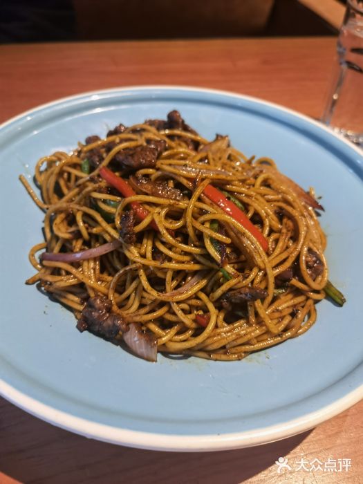 绿茵阁西餐厅(佰港城店)黑椒牛柳炒意面图片