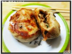 呵着热气的煎包-求生煎包(武夷小区店)