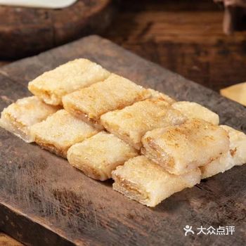 梁家大院是一家富有特色的农家乐，以手工麻糍为招牌美食