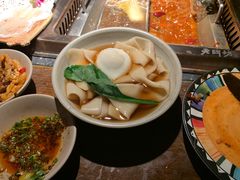 -老牌坊云南鱼豆花火锅(哈西万达店)