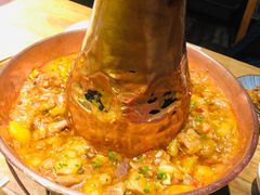 土司铜锅油焖鸡-浩海火烧云傣家菜(京广店)