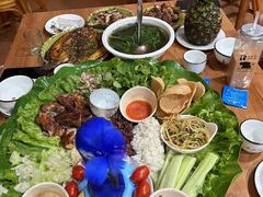 -沐毫傣泐云南菜孔雀宴•手抓饭傣味烧烤(曼听公园店)