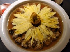 陈年花雕煮花螺-山塘渡·苏式园林餐厅