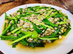 炒螺肉-海口滨海新村143号海南老字号炒菜店