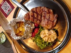 澳洲进口谷饲原切肉眼牛排-百特喜·意大利餐厅(八佰伴镇江店)