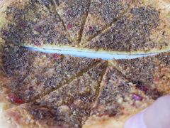 隔壁店的蒜蓉烤馕-清真·马峰烤肉(小学习北巷店)