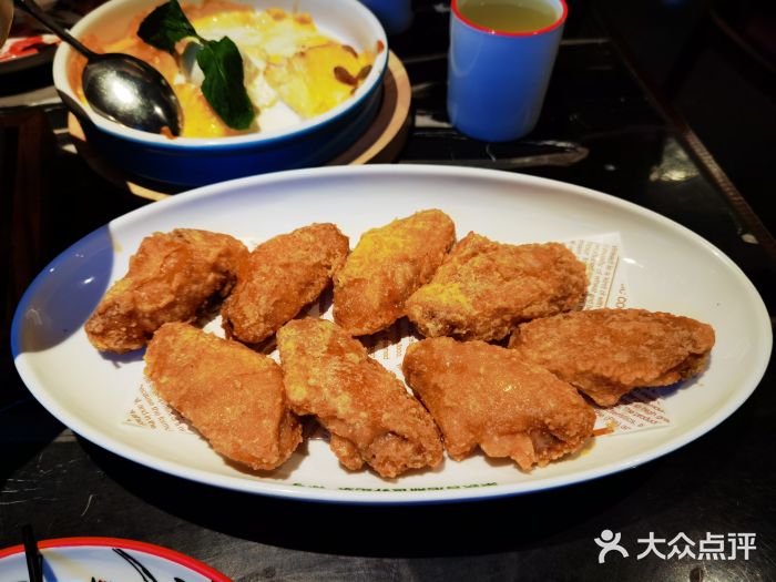 新白鹿餐厅(虹桥南丰城店)蛋黄鸡翅图片