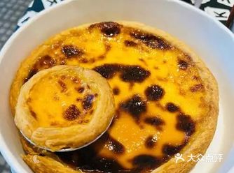 #城市向导官肯德基大蛋挞外观金黄诱人,挞皮层层酥脆