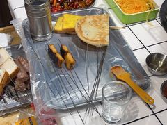 -喜悦小串丹东小黄牛海鲜烧烤大排档(民主广场店)