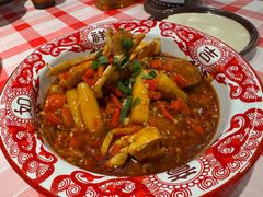 花蟹烧年糕-笨豆腐居民楼菜馆•江西小炒(天津开发区店)