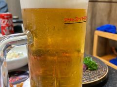 朝日生扎啤-草家酱蟹炭火烤肉店(珲春南路一店)