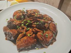 油酱毛蟹烧年糕-金枝玉叶上海人家食府(三里河店)
