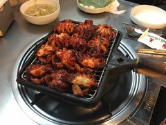 辣烤小章鱼-喜儿家铁网烤章鱼(弘大店)