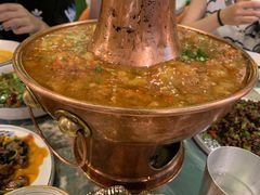 土司铜锅油焖鸡-浩海火烧云傣家菜(京广店)