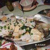 用用瓣开有很多汁流出来，一口下去外脆肉滑够汁够味