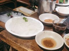 -老牌坊云南鱼豆花火锅(哈西万达店)